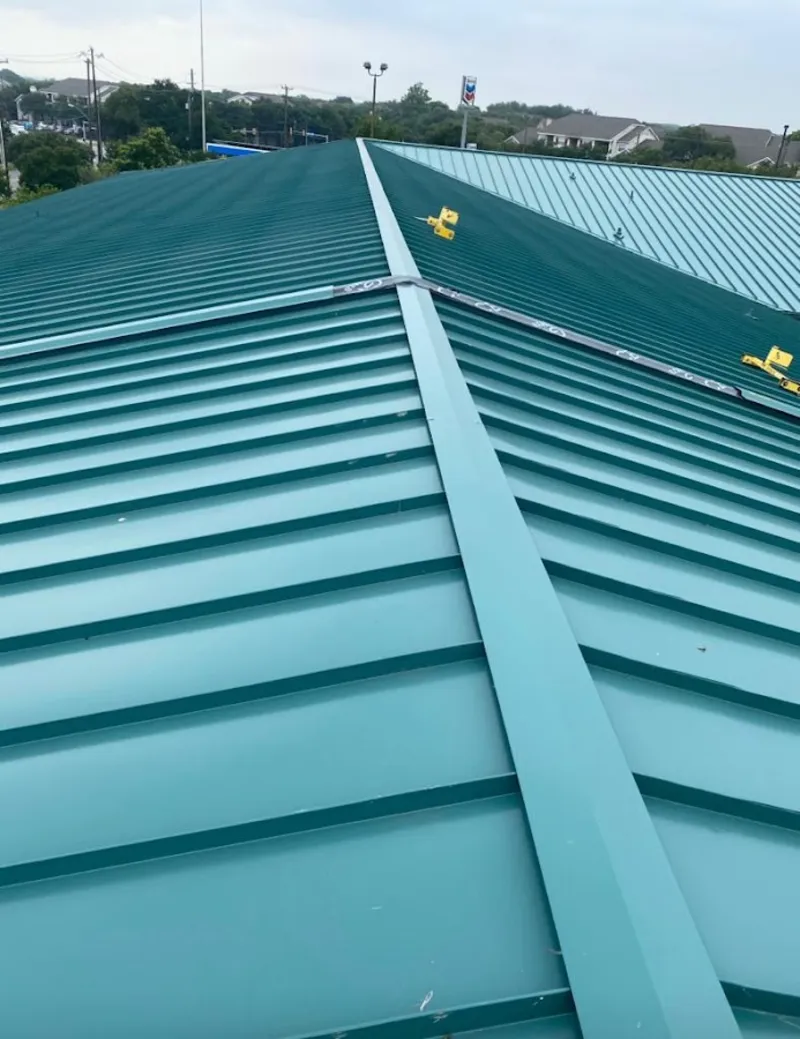Green commercial metal roof ridge and valley for Metal Roof Repair in Ira